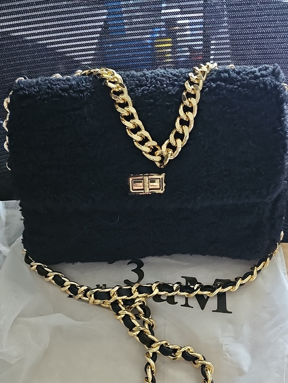 Black Faux Shearling Shoulder Bag with Gold Chain Strap